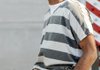 Christopher Gray is escorted back to jail Monday after pleading guilty in Judge Robin Green’s court in Bentonville to five counts of exposing another person to human immunodeficiency virus.
