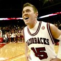 Rotnei Clarke celebrates Tuesday night after Arkansas' 66-62 win in overtime over Missouri State at ...
