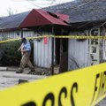 Dennis Ledbetter, fire investigator with the Fayetteville Fire Department, walks out of the Restaura...