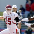 Arkansas quarterback Ryan Mallett tries to escape from Ole Miss’ Kentrell Lockett on Oct. 24 in Oxfo...