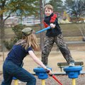 Wesley Porter, 10, uses playground equipment Tuesday to try to get an advantage on his sister Amanda...
