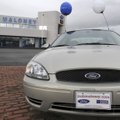 The lot at Bob Maloney Ford in Rogers holds only a few cars Wednesday.


