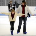 Ally Swindell, 6, works on her balance as her mother, Renee Swindell, both of Bentonville, gives her...