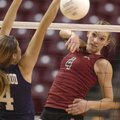 Siloam Springs’ Hannah Allison hits past Greenwood’s Keeley Treece during the Class 5A state volleyb...