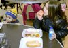 Orion General, 2, and Alissa Creech, 7, eat a Christmas dinner Friday at the Bentonville Church of Christ during the annual B&B Fund Drive in Bentonville.
CHRISTMAS DINNER