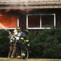 Firefighters fight a fire that broke out Thursday at a house at 1527 Wren Lane in east Fayetteville....