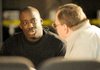 Ron Harris, left, talks with Celebrate Family Church member Barry Gabbert before giving a motivational speech to teens at the Village on the Creeks Athletic Club in Rogers on Dec. 19.