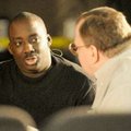 Ron Harris, left, talks with Celebrate Family Church member Barry Gabbert before giving a motivation...