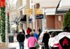THE DAY AFTER
After-Christmas bargain hunters and gift exchangers began arriving on a cold Satruday morning at Pinnacle Hills Promenade in Rogers.
