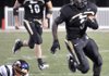 Bentonville running back Courtney Haskell scores a touchdown against Rogers Heritage on Oct. 9 in Tiger Stadium in Bentonville. Haskell is the All-Northwest Arkansas Big 6 Newcomer of the Year.
