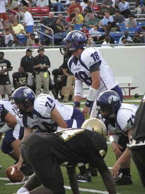 Fayetteville quarterback Brandon Allen calls a play during the Purple’Dogs’ season-opening 31-0 win over Little Rock Central on Aug. 31 in War Memorial Stadium in Little Rock.
