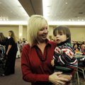 CASA PARTY
Tiffany Savage holds her son, Parker, 1, during the third annual Court Appointed Special...