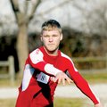 Justin Brown of Westville, Okla., participates in passing drills during the Arkansas War Cats’ tryou...