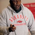 Arkansas War Cats coach and former Arkansas Razorback Thurman Shaw times players running drills duri...
