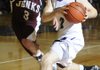 Fayetteville’s Jack Jones, right, looks to pass the ball as Jenks’ Mason Evans defends in the first half Dec. 1 in Fayetteville.