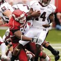 Arkansas tackle Malcolm Sheppard sacks Mississippi State backup quarterback Chris Relf during the No...