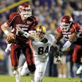 Arkansas quarterback Ryan Mallett scrambles out of the pocket against LSU on Nov. 28 in Tiger Stadiu...