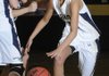 Shiloh Christian’s Meagan Henley, right, dribbles during Monday’s game against Siloam Springs in Springdale.
