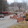 Traffic moves Wednesday along Arkansas 102 in the construction area between Bentonville and Centerto...