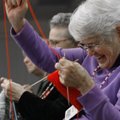 Weekly fun Doris Cole (right) of Bella Vista laughs with other members of the Bella Vista Needlework...