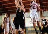 Bentonville’s Grant Higgins takes the ball to the basket under pressure from McDonald County (Mo.) guard Mason Haddock during Tuesday’s game at the 55th annual Neosho Holiday Classic in Neosho, Mo.