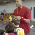 Former Arkansas basketball player Corey Beck works with youngsters Tuesday at the Corey Beck Winter ...
