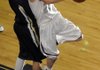 Siloam Springs junior Kyle Teague, right, takes a shot as Shiloh Christian sophomore Taylor Thompson defends Tuesday in the second half of the Har-Ber Holiday Basketball Tournament in Springdale. Teague had 40 points in the Panthers’ 63-53 victory.