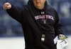 n this Dec. 28, 2008, file photo, Texas Tech head coach Mike Leach gives directions to his team during football practice for the Cotton Bowl NCAA college football game at Texas Stadium in Irving, Texas. 