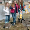 Winter snack Jersi Jo Clayton (from left), 6, and her sisters Darla Clayton, 10, and Destany Clayton...