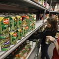Organization Morgan McDaniel (left), 12, and Shelby Horner, 15, both of Bella Vista, organize the sh...