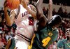 Arkansas' Jemal Farmer (2) bumps into Baylor's Quincy Acy (4) as he tries to pass the ball during the Baylor v. UA game Wednesday night at Verizon Arena in North Little Rock.