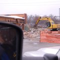 Capt. Tony Grimes watches as Bentonville’s old Fire Station No. 1, at 215 S.W. “A” St., is demolishe...
