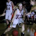 Gravette’s Julia Himsl drives to the hoop against West Fork in the Alma Classic on Wednesday in Alma...
