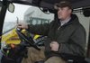 Jeremiah Girdley, operations and maintenance supervisor at the Rogers Municipal Airport, warms up a piece of equipment Wednesday. The airport will increase rates on hangar rentals, ground leases and fuel flowage beginning Friday.