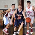 Rogers Heritage’s Brandon Brzozkiewicz, center, drives past Webb City, Mo., defenders Dillon Wales, ...