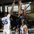 Springdale Har-Ber senior Michael Trexler shoots over Conway sophomore Xavier Clardy, left, and seni...