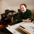 Charles Alison enjoys his upstairs bedroom in his house in Fayetteville.