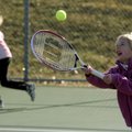 BREAKING IT IN
Sarah Boyce, 6, tries to hit a tennis ball Friday while playing with her parents at ...
