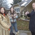 Patricia Tomasiello, left, her daughter, Angela Tomasiello, and Realtor Mike Maxwell look over a fix...