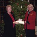 Washington County Democratic Women  President J.P. Peters, left, presents Economic Opportunity Agenc...