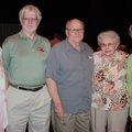 Walton Arts Center volunteers Kathryn and Ralph Harvey, from left, and Jessie Owens, right, talk wit...