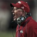 Arkansas Coach Bobby Petrino yells at his team during the Razorbacks' 20-17 overtime win against Eas...