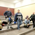 Benton County Sheriff’s Office Deputy Todd Clow, left, evaluates the actions of officers after an ex...