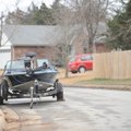 A boat on a trailer sits on a street Thursday in east Fayetteville. The City Council will consider c...
