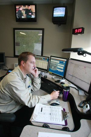   Chris Braithwaite, communication specialist, at his console in the communication's center at Arkansas Children's Hospital in Little Rock, Dec. 31. ACH has received $281,438 in CSEPP money since 2005. It was used to purchase a communications system at the hospital.