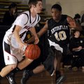 Bentonville’s Will Worthey guards McDonald County, Mo., guard Sy Morris during their game Dec. 29 at...