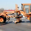 An Arkansas State Highway & Transportation Department grader operator turns around Monday at the Mis...