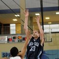 Springdale Har-Ber senior Chris Bayles, right, shoots over Conway’s Everett Reed during the first ha...