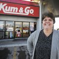 Tammy Johnson of Rogers stands outside the Kum & Go store in Lowell on Monday where she bought a $50...