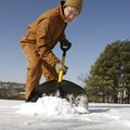Daryl Kendrick shovels snow and ice from his driveway Monday on North Gregg Avenue in Fayetteville. ...